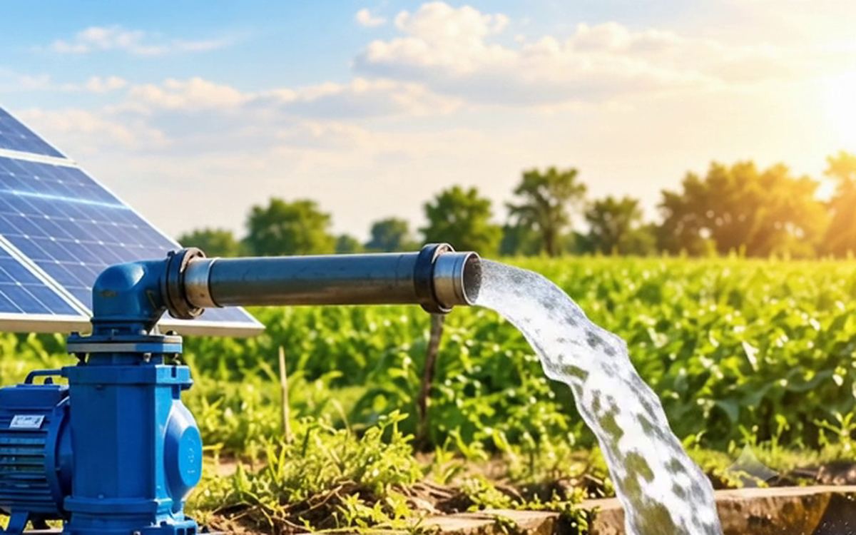 Water flowing from a solar pump outlet into a field channel
